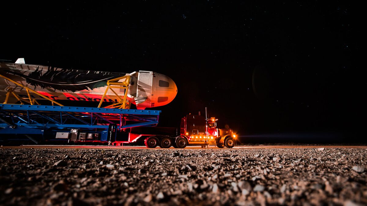 Blue Origin’s fully reusable New Shepard space vehicle rolls out to the launch pad at the company’s West Texas launch site.