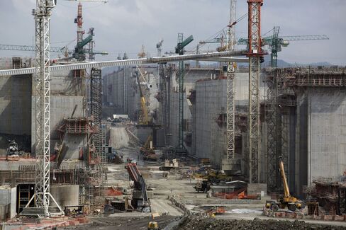 Cranes stand at a construction site for the expansion of the the Panama Canal, on the Pacific side of the canal near Panama City on April, 24, 2014.