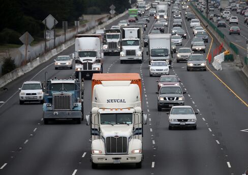 Trucks drive along Interstate 80 in Berkeley, California.
