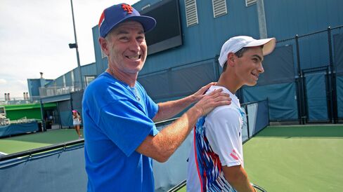 John McEnroe with 16-year-old Rubin at Sportime on Randall’s Island in New York on Aug. 21, 2012.