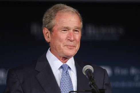 George W. Bush And Laura Bush Speak At Veteran's Employment Opportunities Summit In D.C.