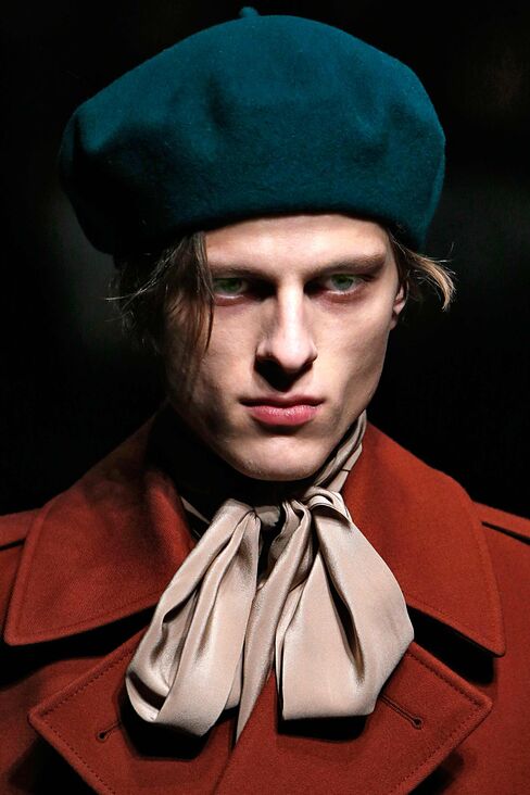 A model at the fall 2015 Gucci show in Milan wore the brand's floppy-bow, silk blouse.