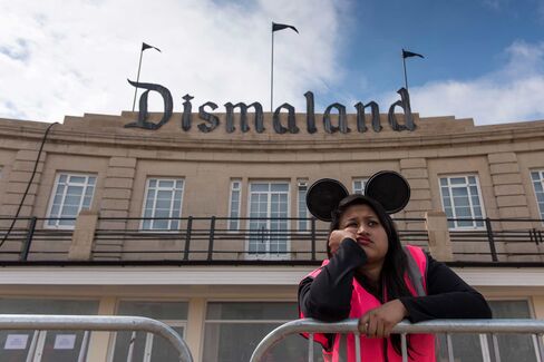 A steward is seen outside Bansky's 'Dismaland' exhibition on Aug. 20, 2015 in Weston-Super-Mare, England.