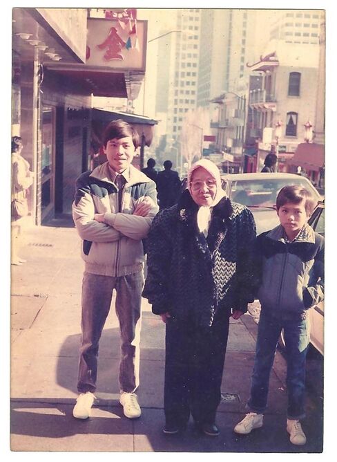 Tran (right) with his grandmother and brother in San Francisco.