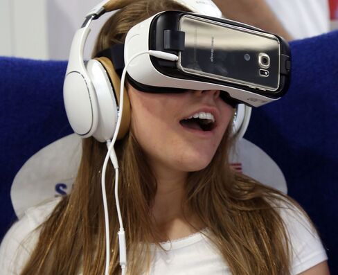 PHILADELPHIA, PA - JULY 04:  Attendees at Team USAs Virtual Reality Experience  Powered by Samsung Gear VR during the 2015 Road to Rio Tour at Fairmount Park on July 4, 2015 in Philadelphia, Pennsylvania.  (Photo by Bill McCay/Getty Images for Samsung)