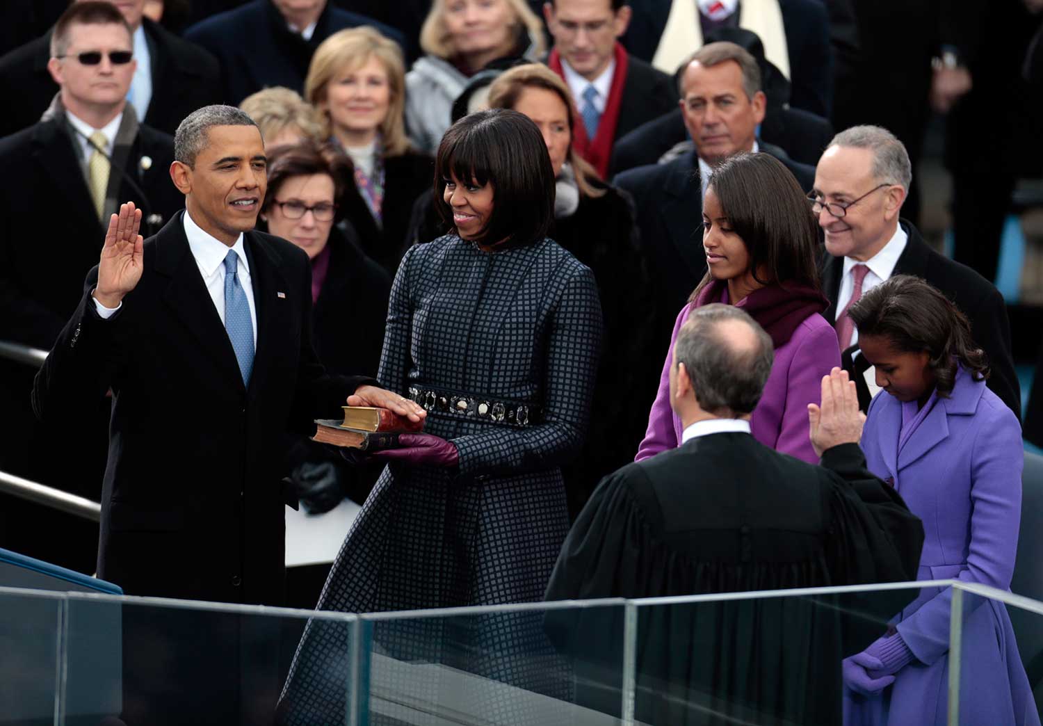 <p>President Barack Obama, left, takes the oath of office for his second term from Supreme Court Chief Justice John Roberts, right, on Jan. 21, 2013.&nbsp;</p>