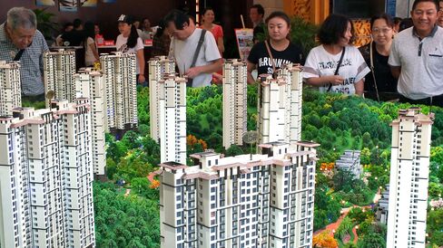 Chinese home buyers visiting a housing fair in Yichang, in China's Hubei province.
