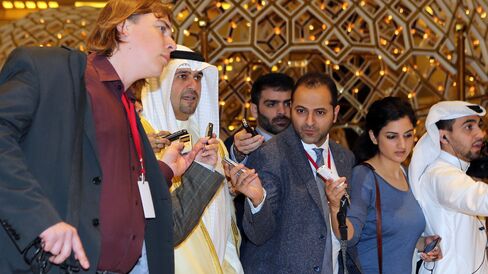 Anas al-Saleh, second left, arrives for the Doha talks in the Qatari capital Doha, on April 17, 2016.