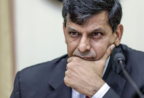 Raghuram Rajan, governor of the Reserve Bank of India (RBI), pauses during a news conference.
