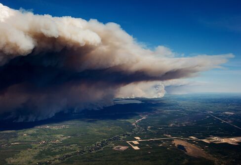 Smoke rises over Fort McMurray on May 6.