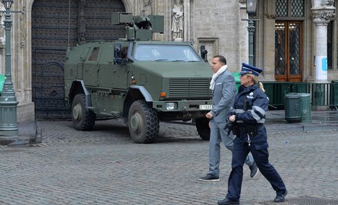 Belgian security forces patrol on the streets