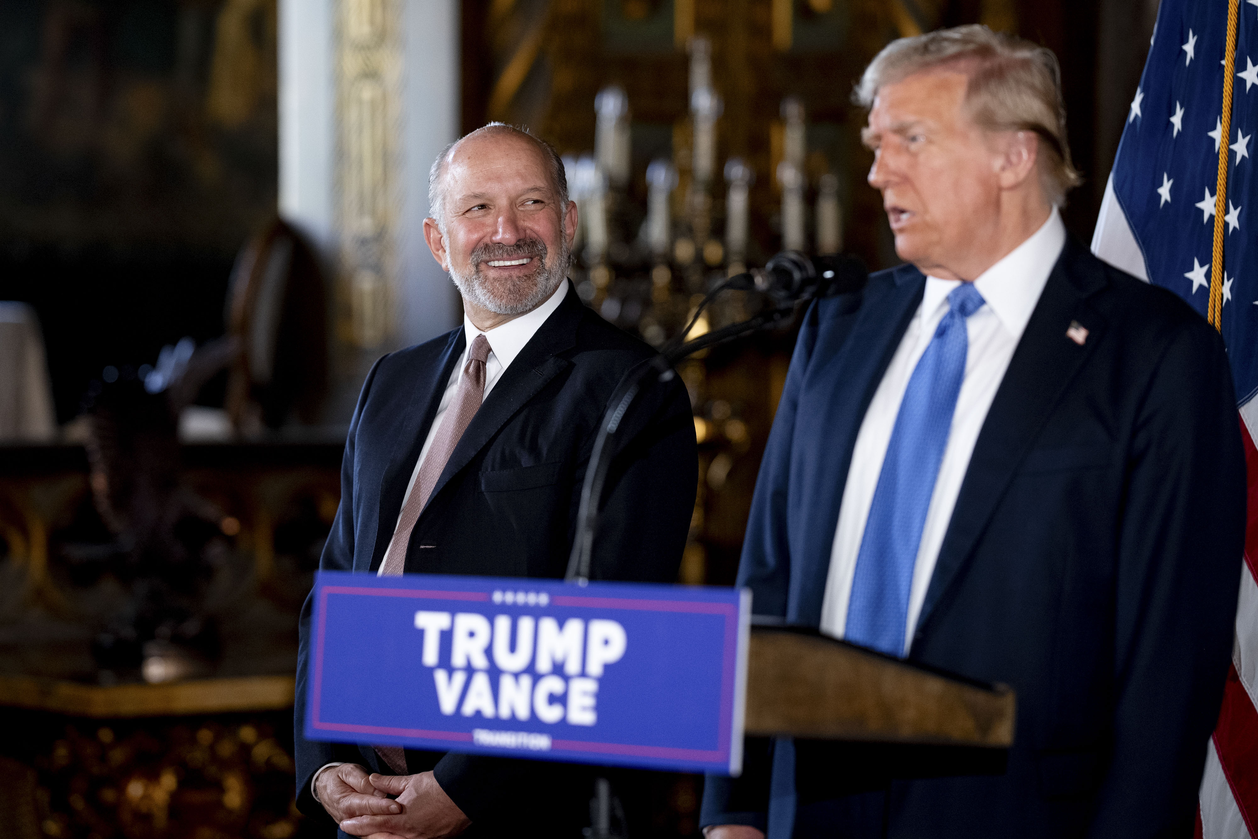 Howard Lutnick standing next to Donald Trump at Mar-a-Lago