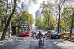 The tree-lined Avenida Paseo de la Reforma in Mexico City —&nbsp;a city whose scale and environmental precarity have made it a rich source of urban solutions.&nbsp;