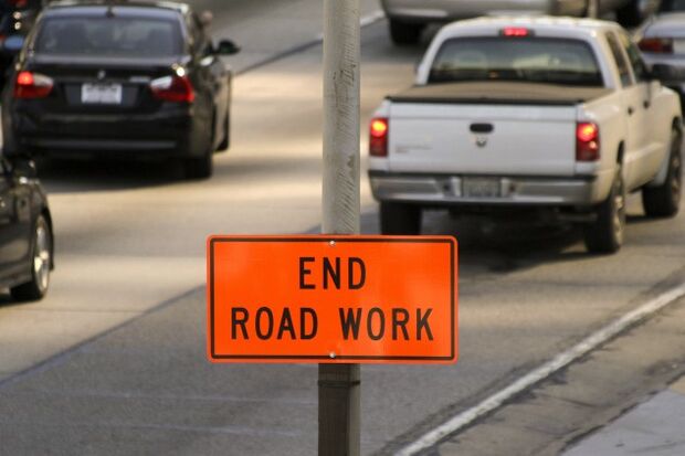 “end road work” sign displayed on the Harbor Freeway in Los Angeles, California