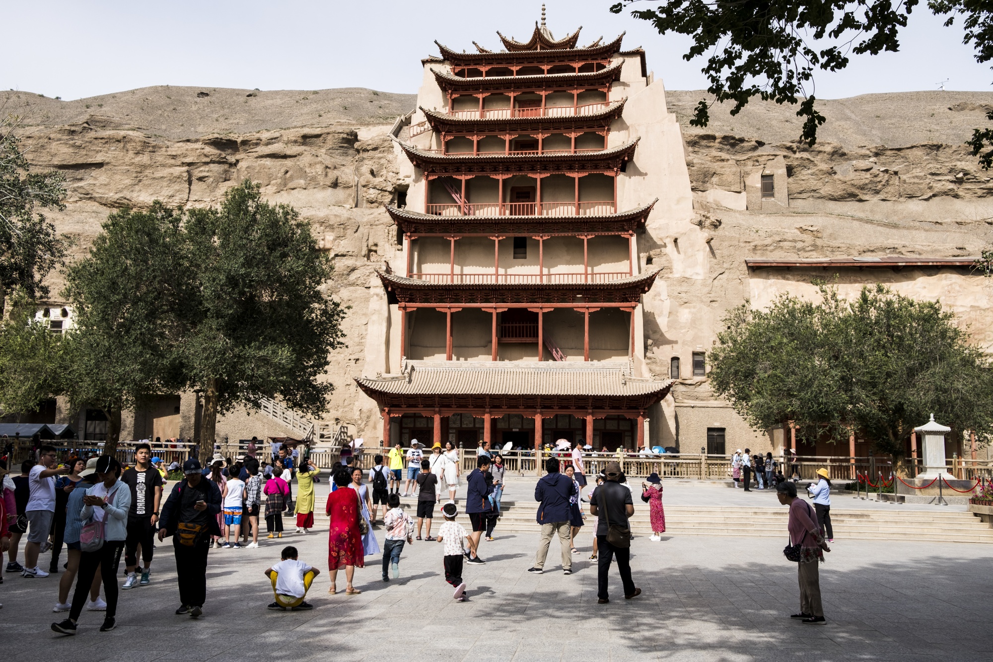 Tourists at the Mogao Caves in Dunhuang in August 2019. 