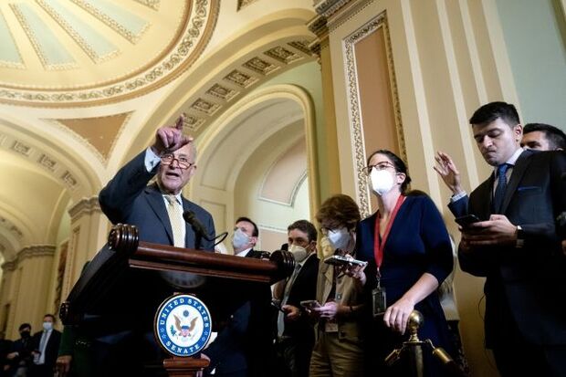 Schumer speaking at the Capitol