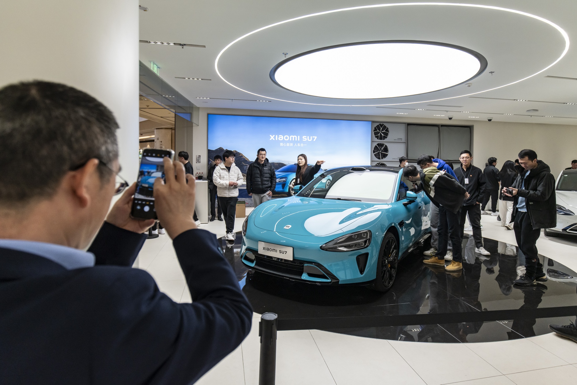 Xiaomi SU7 Electric Vehicle On Display at Stores