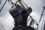 A crane unloads the first shipment of anthracite coal from U.S. supplier XCoal Energy & Resources LLC, for state energy firm Centrenergo PJSC, onto the dockside at Yuzhny Port, near Odessa, Ukraine, on Wednesday, Sept. 13, 2017. A Pennsylvania company will send 700,000 tons of coal to Ukraine in a deal the administration of President Donald Trump heralded as an important tool to undercut the power Russia has over its European neighbors.
