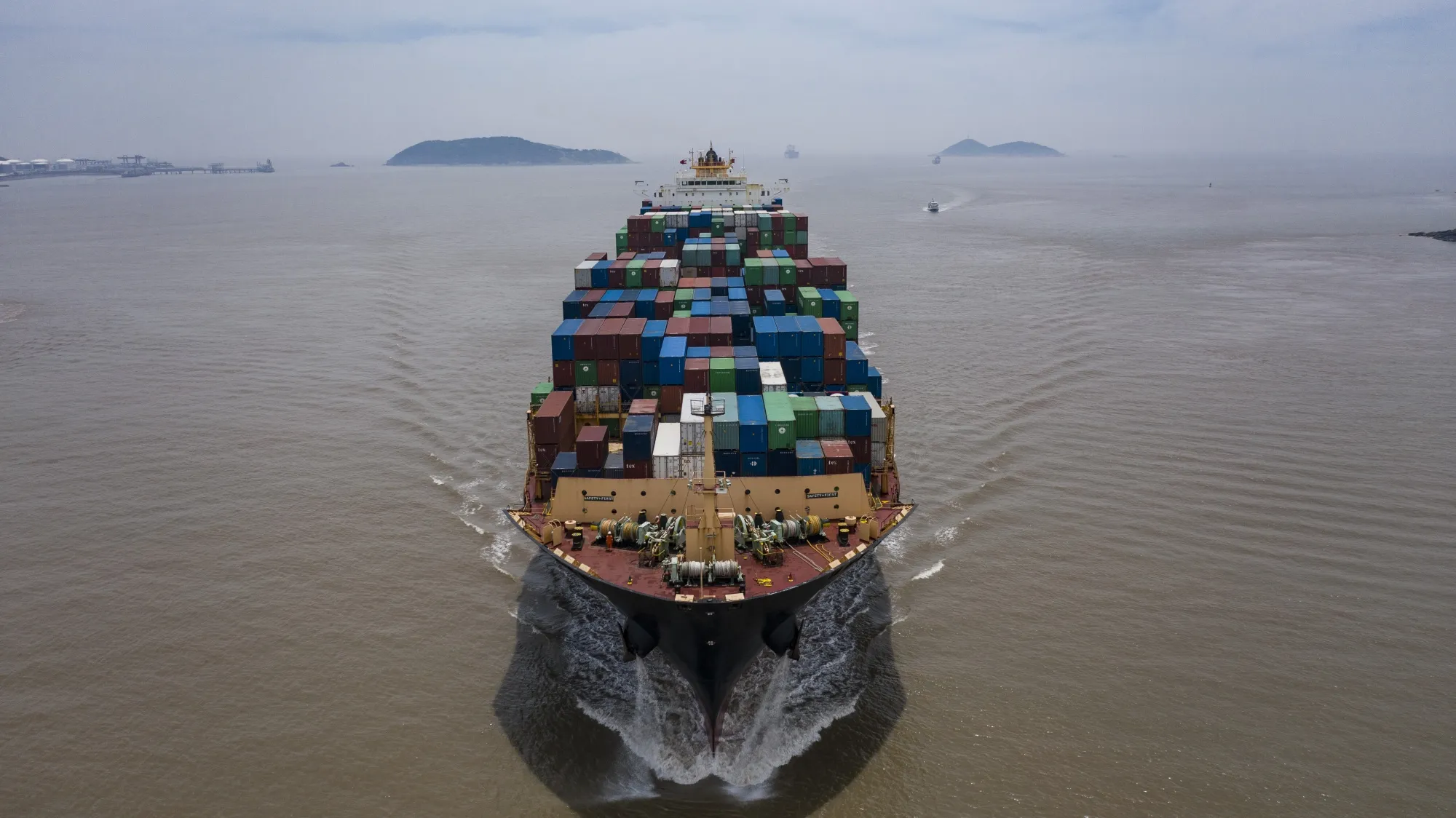 A container ship&nbsp;approaches the Yangshan Deepwater Port in Shanghai, China.