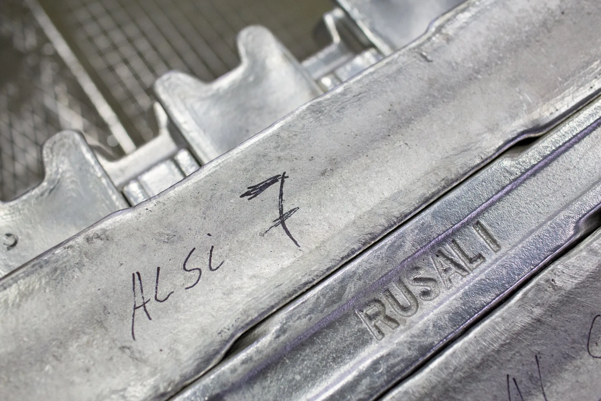 Branding for Rusal on aluminum ingots.