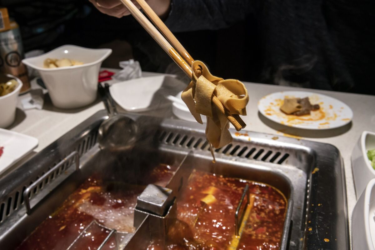 China Hotpot Chain Haidilao Surges 20 as Covid Cost Cuts Bear Fruit