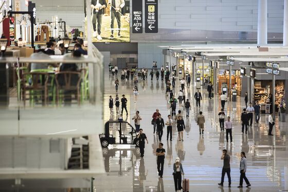Hong Kong Airport Chaos Gives Huge Boost to Rivals Across Border