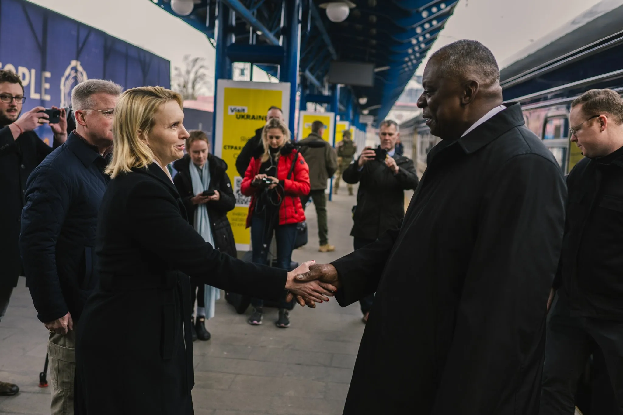 Lloyd Austin, right, arrives in Kyiv on Nov. 20.