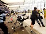 Police scuffle with demonstrators at Hong Kong’s International Airport on Aug. 13.