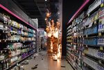 Products burn at a Carrefour supermarket in Sao Paulo, on Nov. 20.