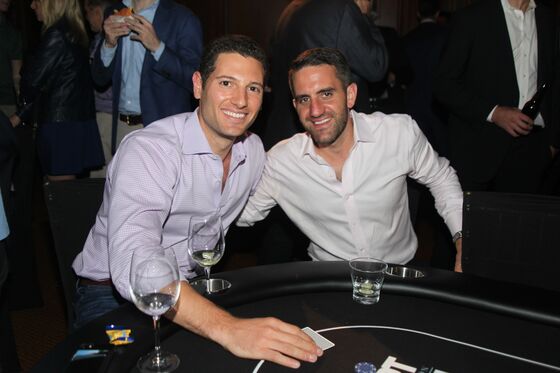 Derivatives Trader Hits a Full House for Charity Poker Crown