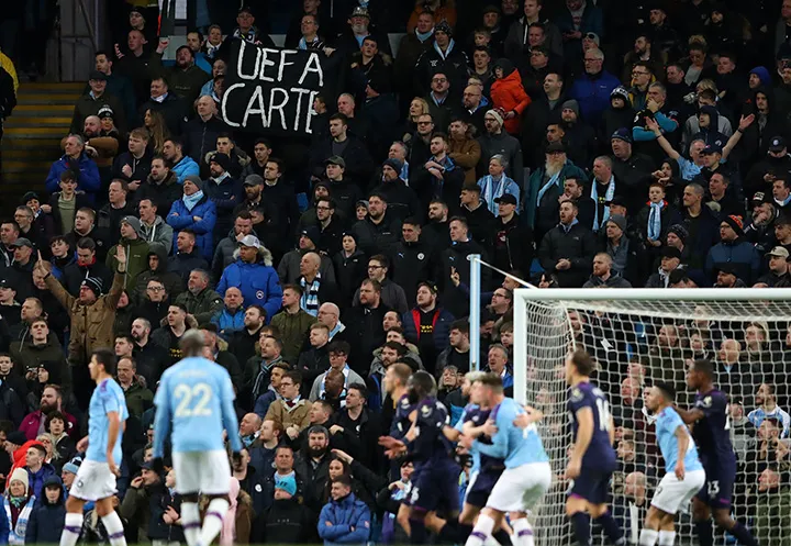 Manchester City fans send a message to UEFA during a match with West Ham United.