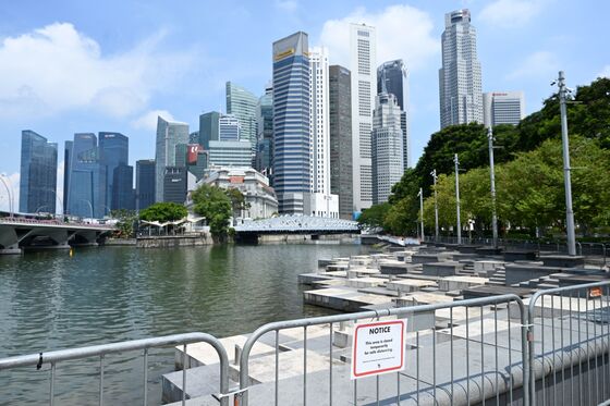Singapore Grapples With Reopening Plans as Its Rivals Move On