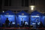 Covid-19 testing outside a building placed under lockdown at the City Garden housing estate in Hong Kong, in Jan. 2022. 