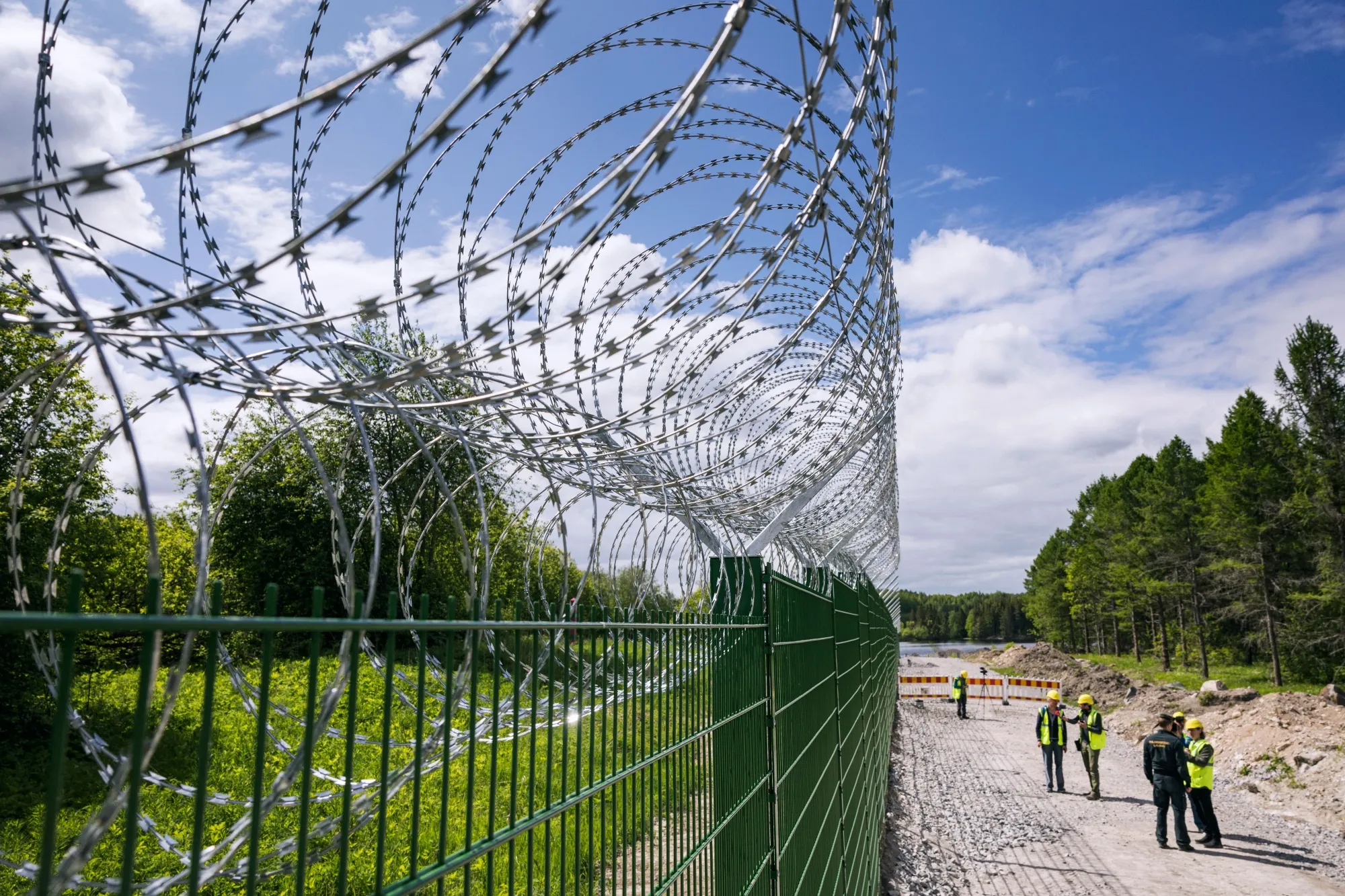 A stretch of fence under construction near a border crossing near Imatra, in southeast Finland.