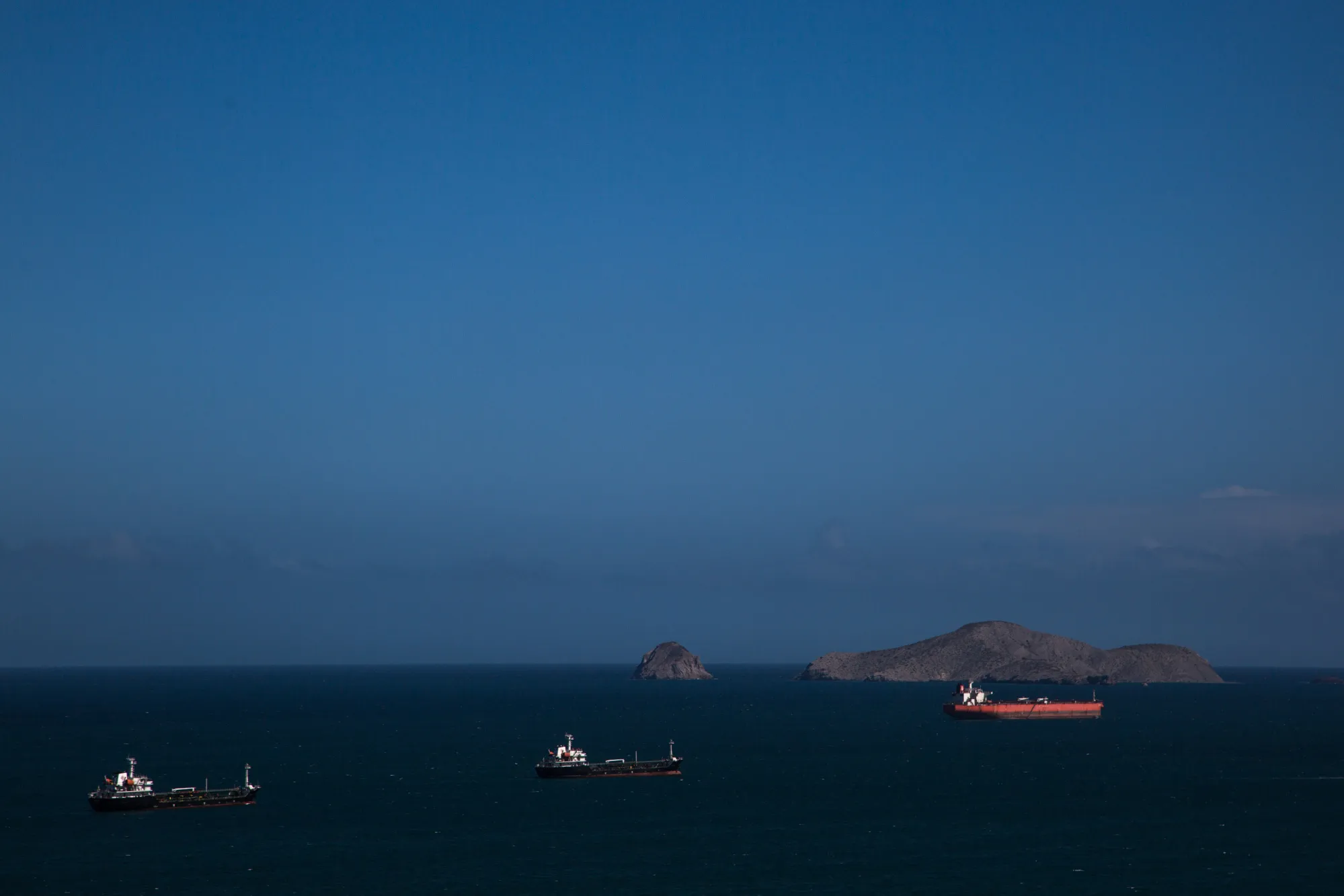 Petroleos de Venezuela SA (PDVSA) oil tankers sit moored in the water near Puerto La Cruz, Anzoategui state, Venezuela, on&nbsp;Feb. 7, 2018.&nbsp;