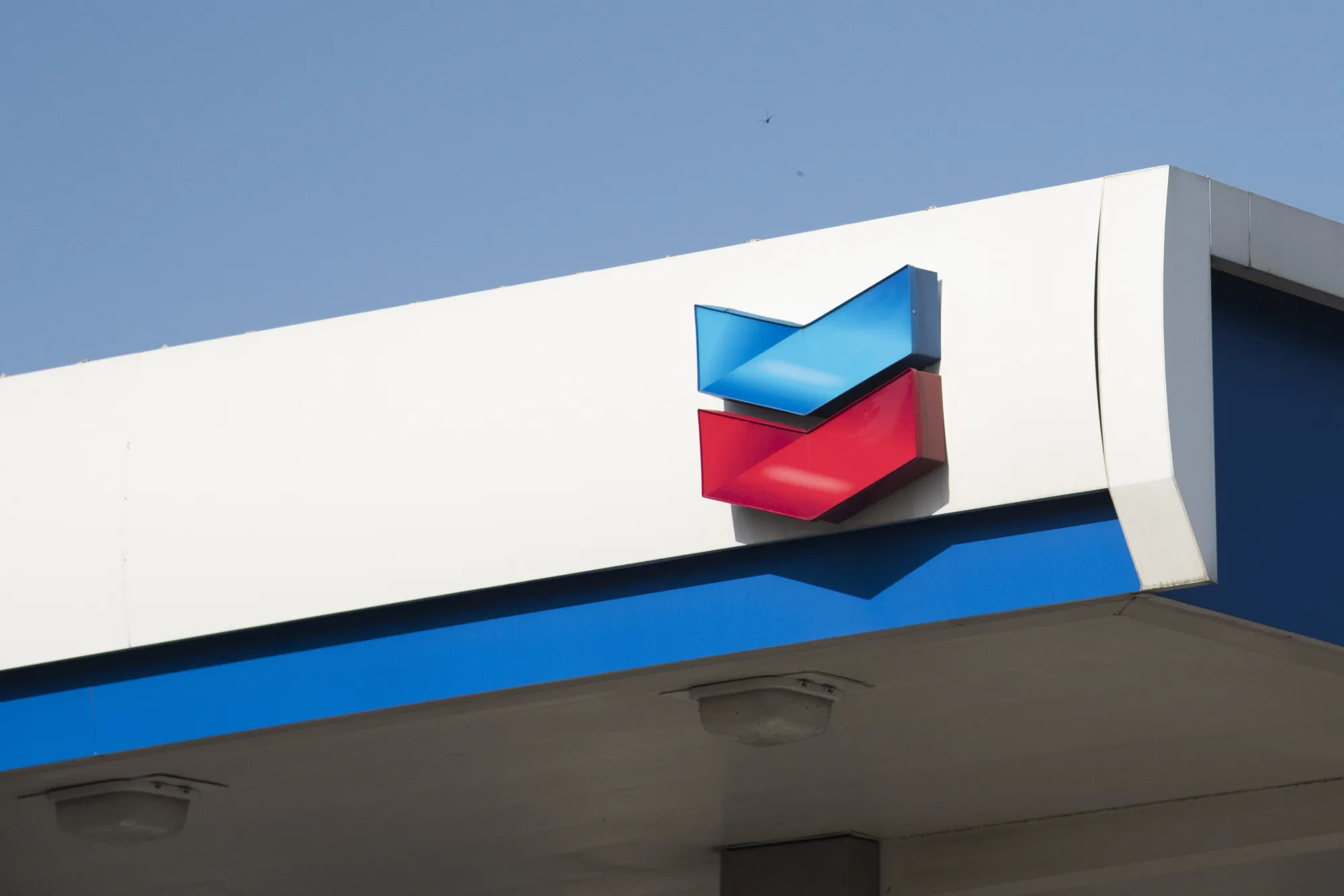 The Chevron Corp. logo is displayed at a gas station.