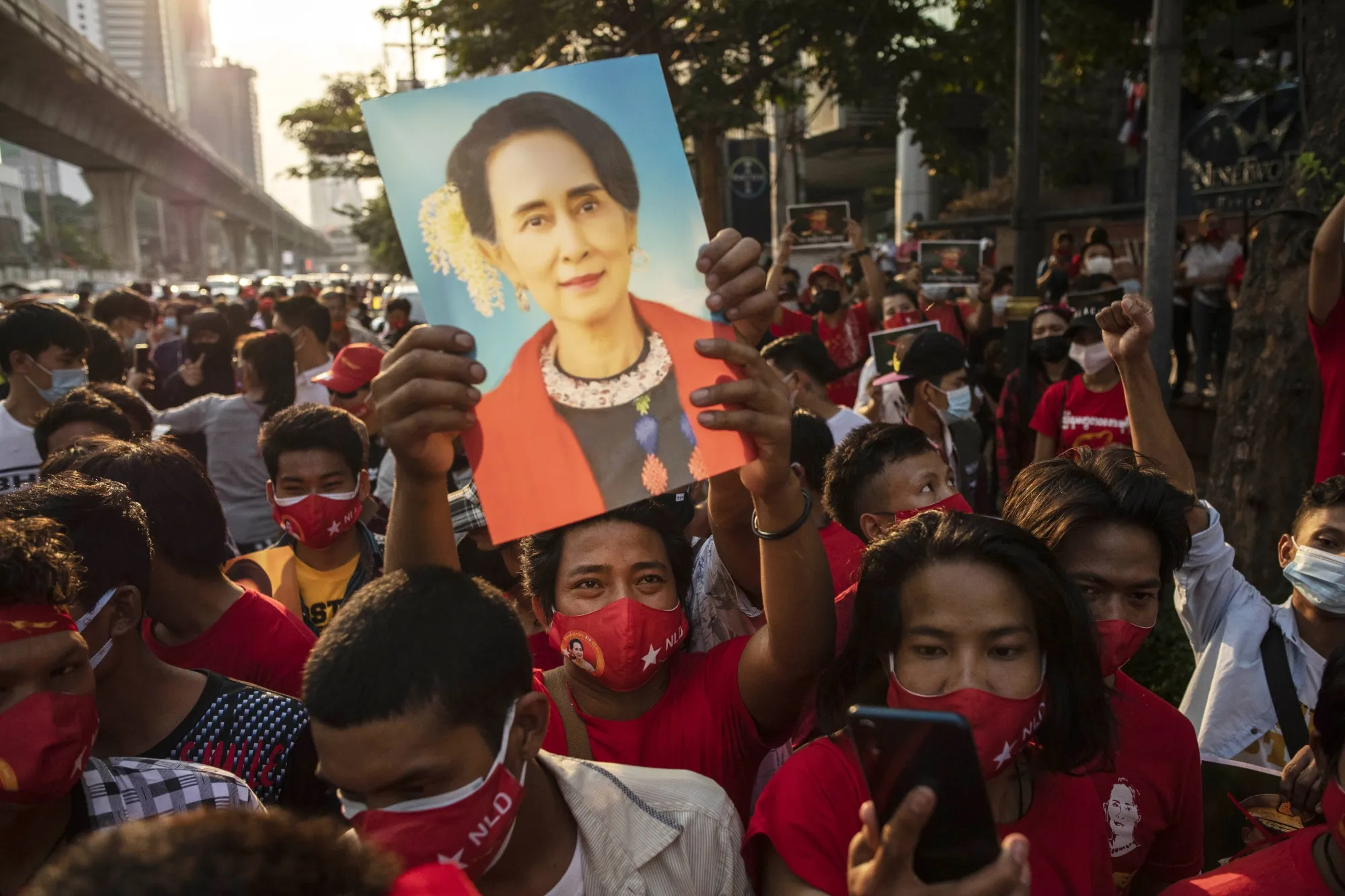 A demonstrator holds up an image of Aung San Suu Kyi during a protest outside Myanmar’s embassy in Bangkok in February 2021.