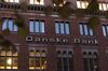 A logo sits on display outside the Danske Bank A/S finance center in Copenhagen, Denmark, on Tuesday, Sept. 18, 2018. Danske Bank A/S Chief Executive Officer Thomas Borgen will step down amid allegations his bank was at the center of a major European money laundering scandal with as much as $234 billion flowing through a tiny unit in Estonia.
