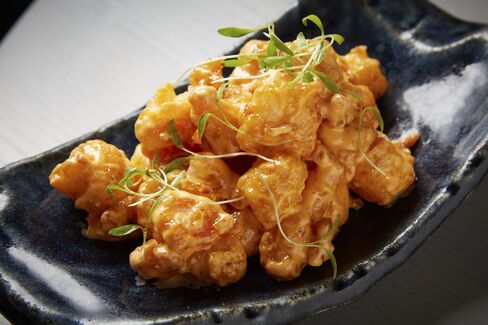 Shrimp tempura, coated in a spicy mayo.