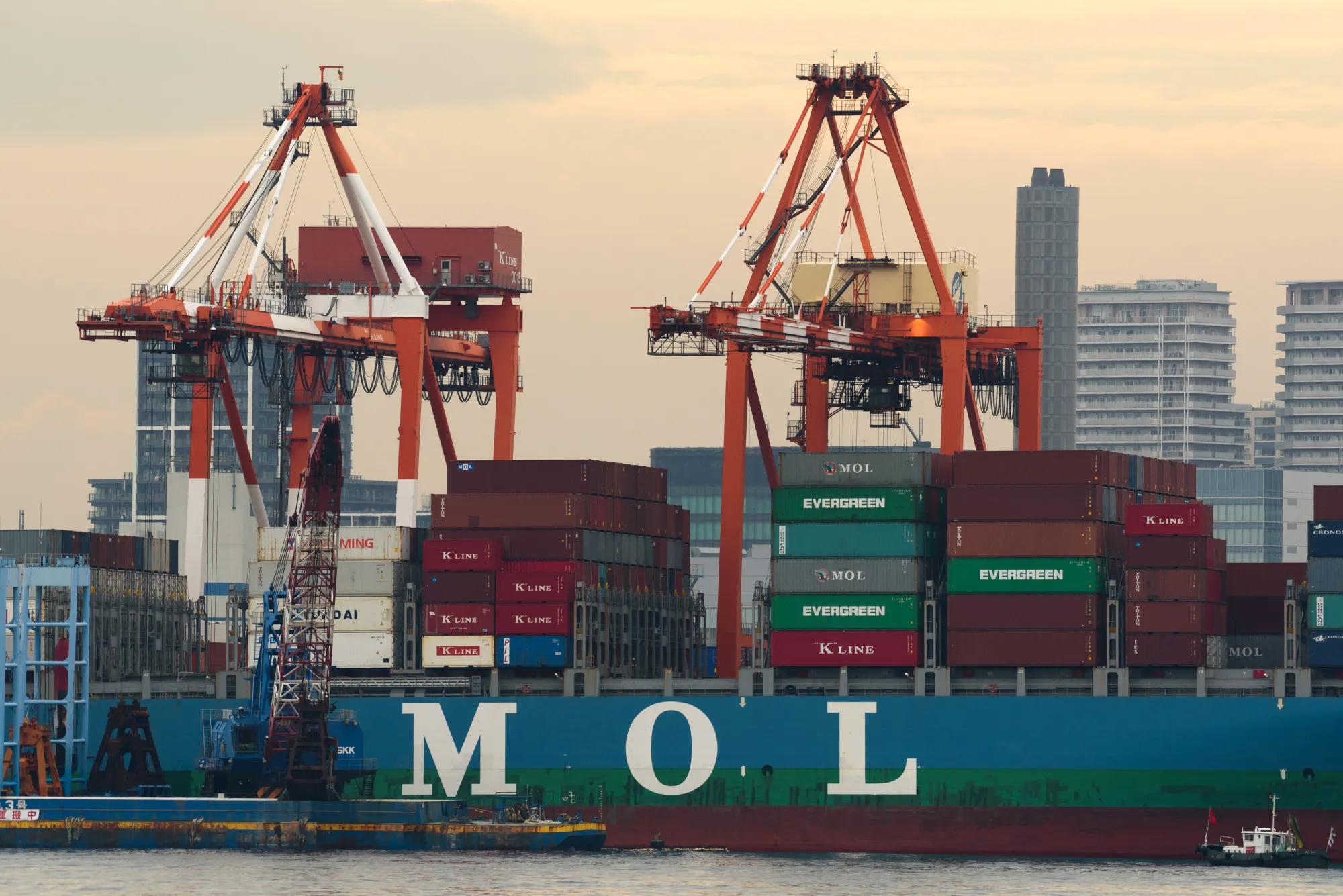A Mitsui OSK container ship at a shipping terminal in Tokyo, Japan.