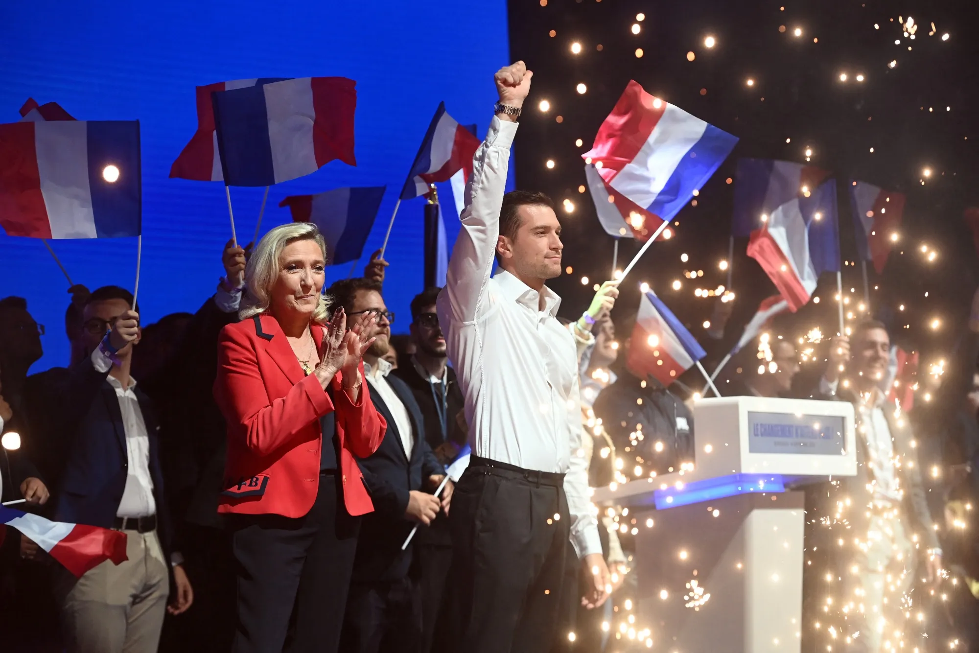 Marine Le Pen, left, and Jordan Bardella acknowledge supporters at a National Rally event in Bordeaux&nbsp;in 2025.