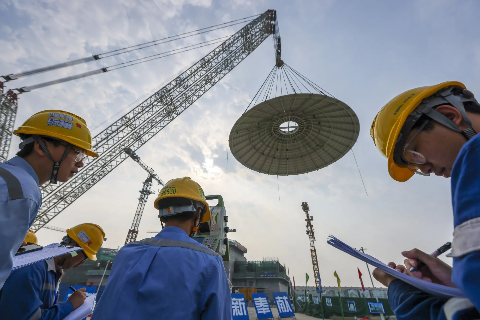 A dome being installed on a commercial small modular reactor in China. The new fund will invest in similar technology in Europe.