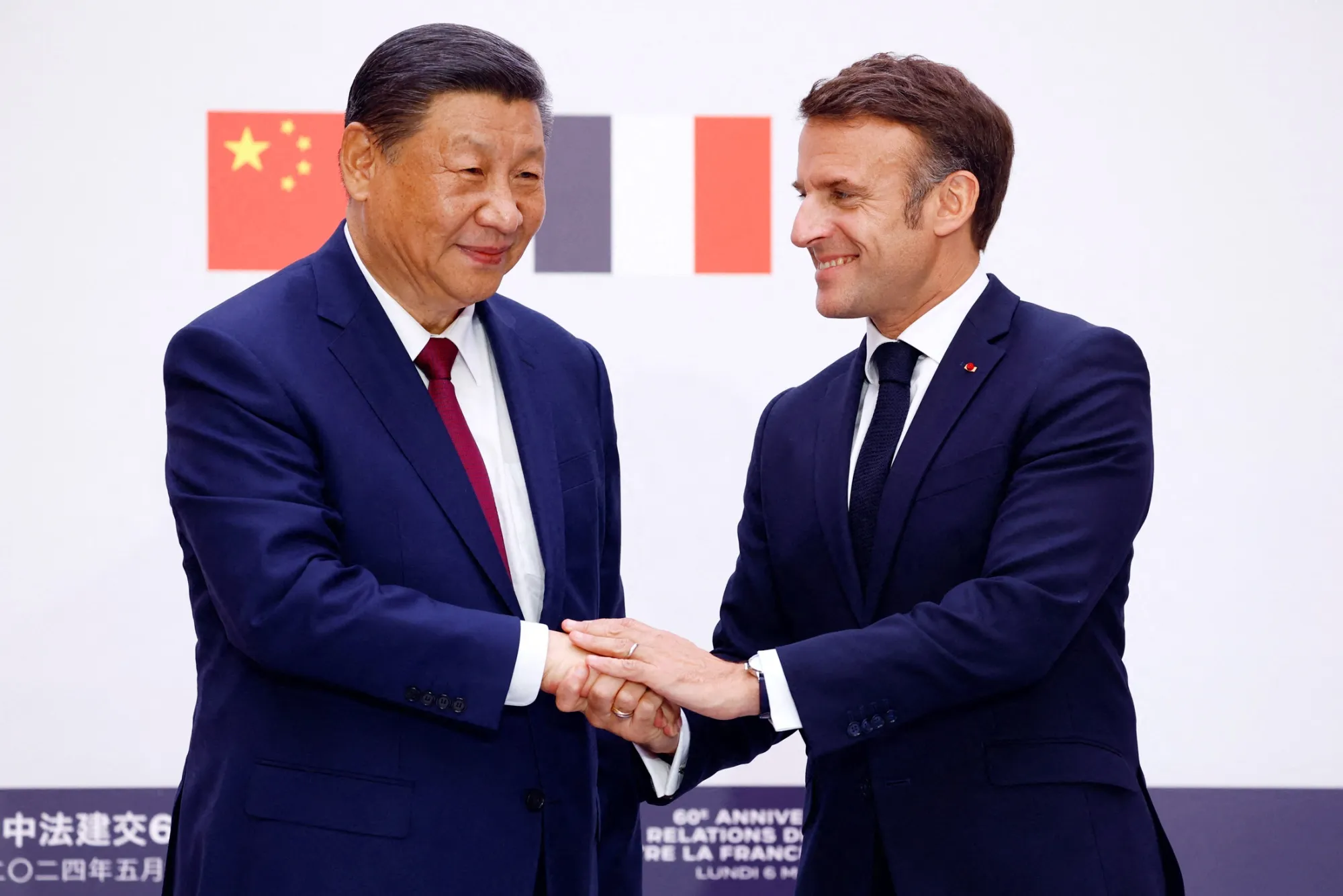 Emmanuel Macron, right, and Xi Jinping in Paris in 2024.