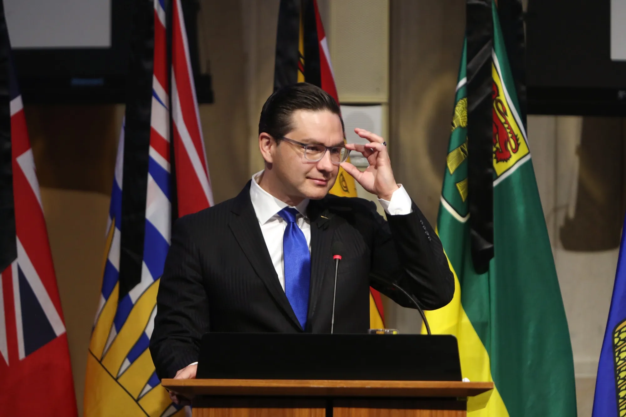 Pierre Poilievre speaks to the Conservative Party caucus in Ottawa on Sept. 12.