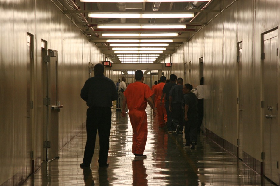 Detainees leave the the cafeteria at the Stewart Detention Facility, a Corrections Corporation of America center in Lumpkin, Georgia.