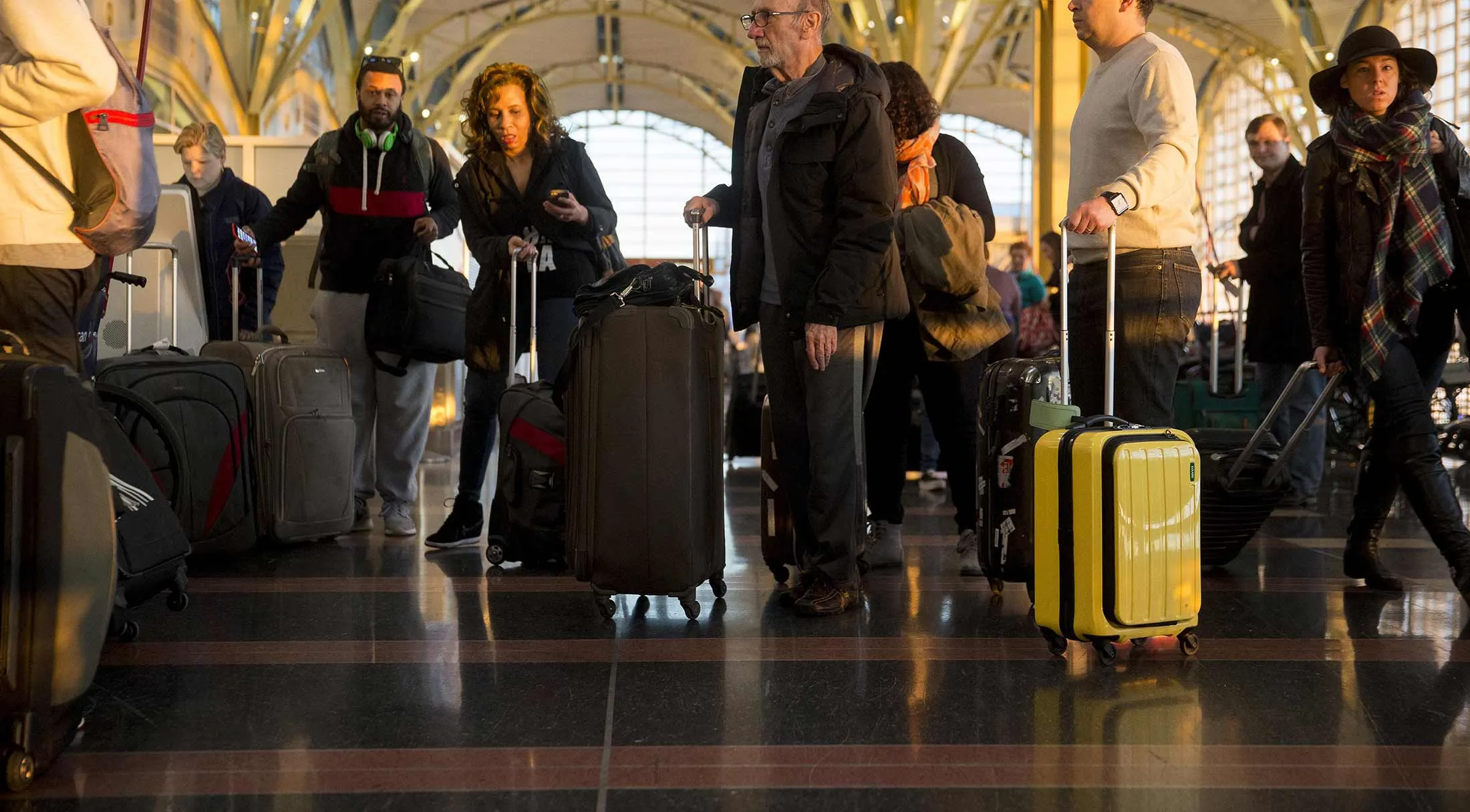 Travelers At Reagan National Airport Ahead Of Thanksgiving Holiday