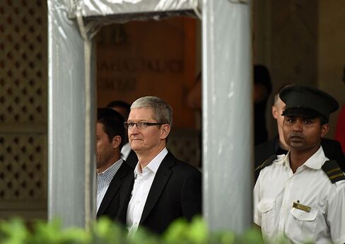 Tim Cook leaves the Taj Mahal Palace hotel in Mumbai.