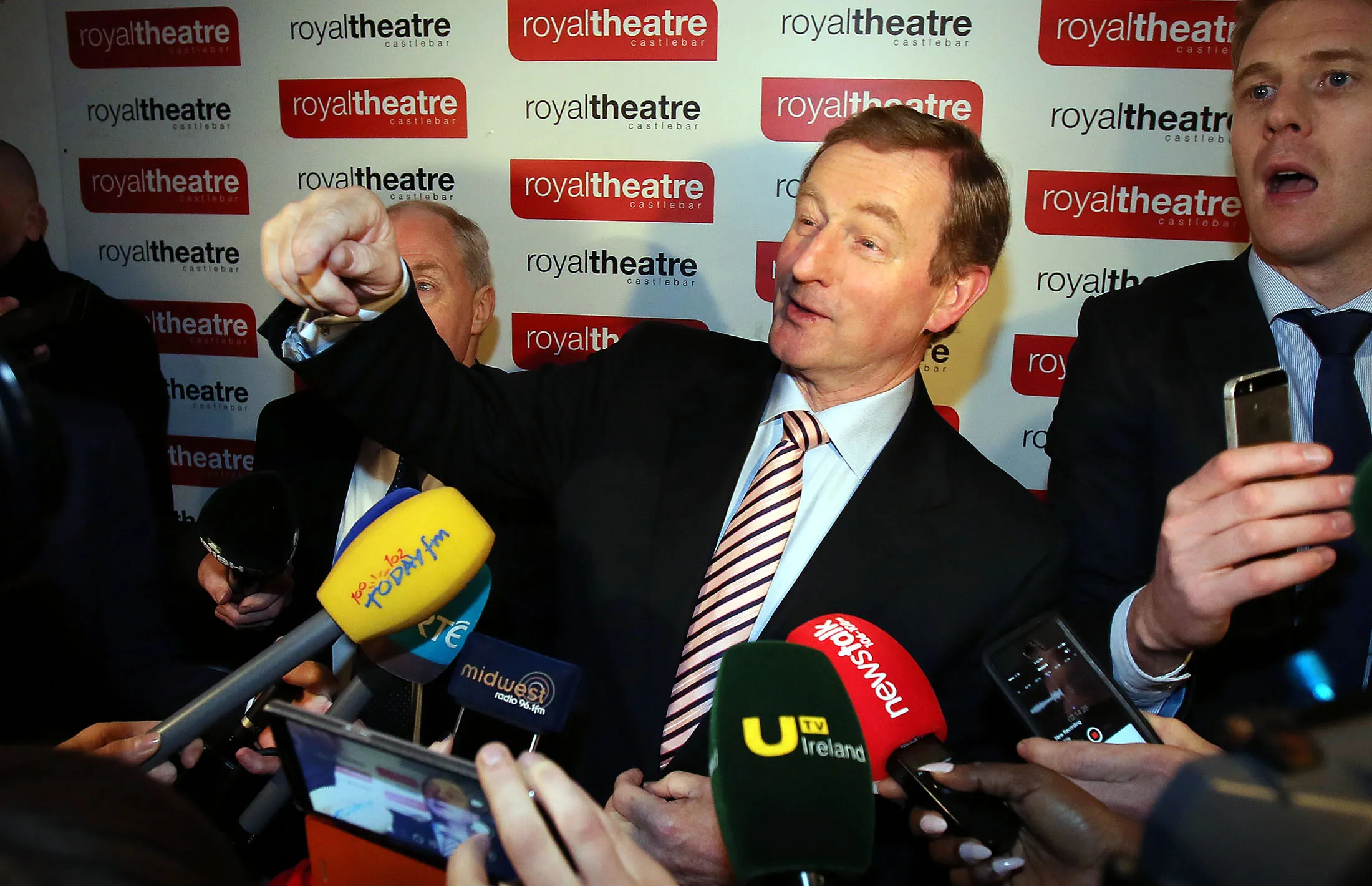Irish Prime Minister Enda Kenny talks to the media at the vote count for the general election in Castlebar.
