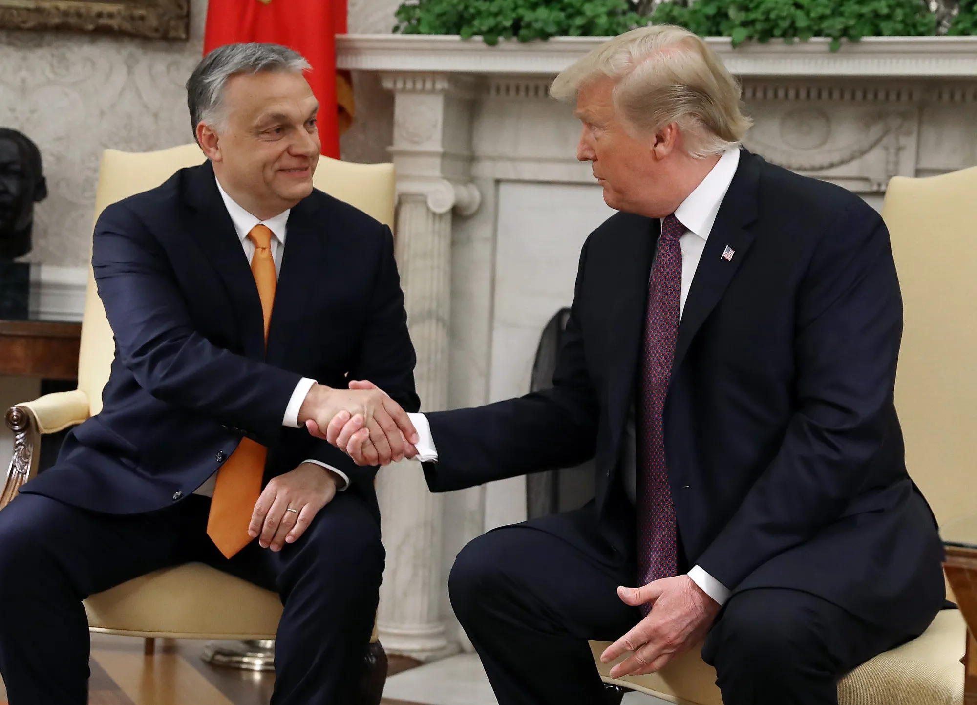 Donald Trump shakes hands with Viktor Orban in&nbsp;2019.