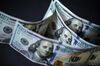 U.S. one-hundred dollar banknotes are arranged for a photograph in Hong Kong, China, on Monday, April 15, 2019. China's holdings of Treasury securities rose for a third month as the Asian nation took on more U.S. government debt amid the trade war between the world’s two biggest economies.